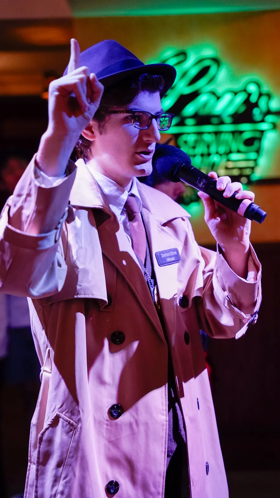 A Murder Mystery Company actor working the room at a Providence show